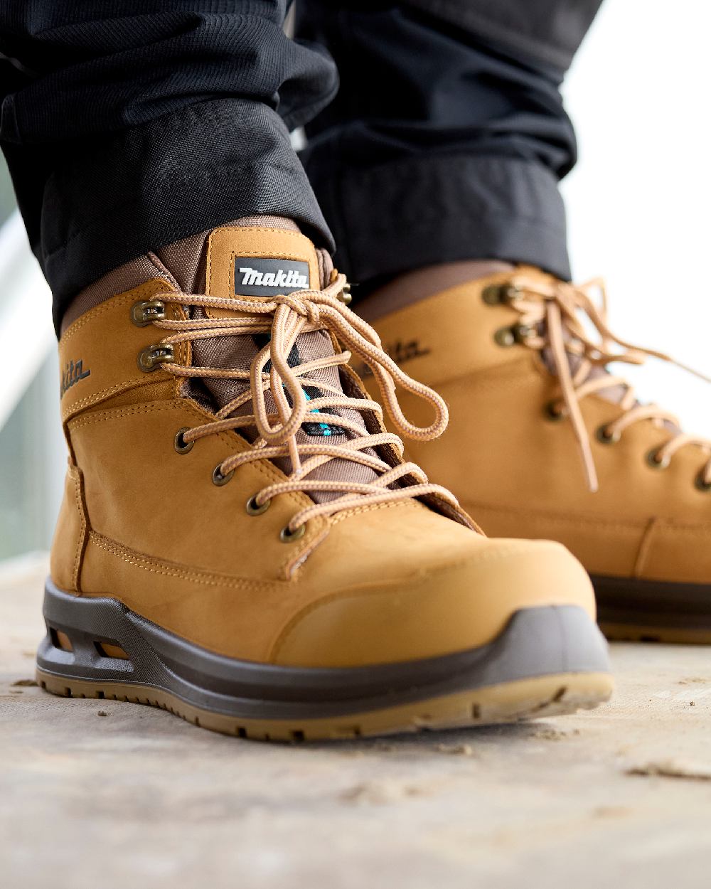 Tan Coloured Makita Mens Kyoto Safety Boots on outdoor background 