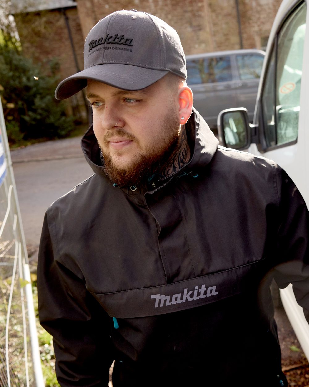 Grey Coloured Makita Mens Origin Baseball Cap on outdoor background 