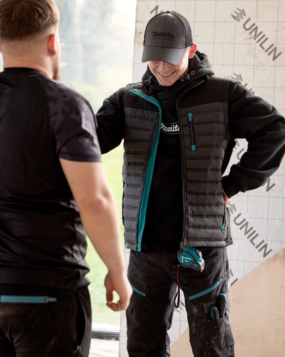 Grey Coloured Makita Mens Shield Bodywarmer on outdoor background 