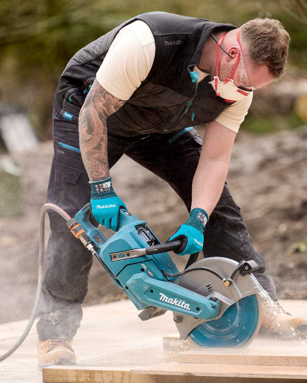 Grey Coloured Makita Mens Shield Bodywarmer on outdoor background 