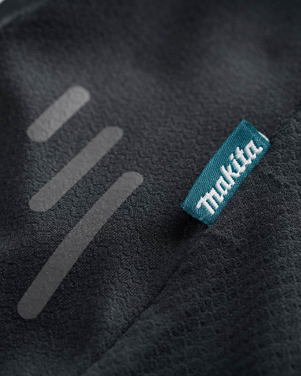 Black Coloured Makita Mens Tech Baselayer Top on white background 