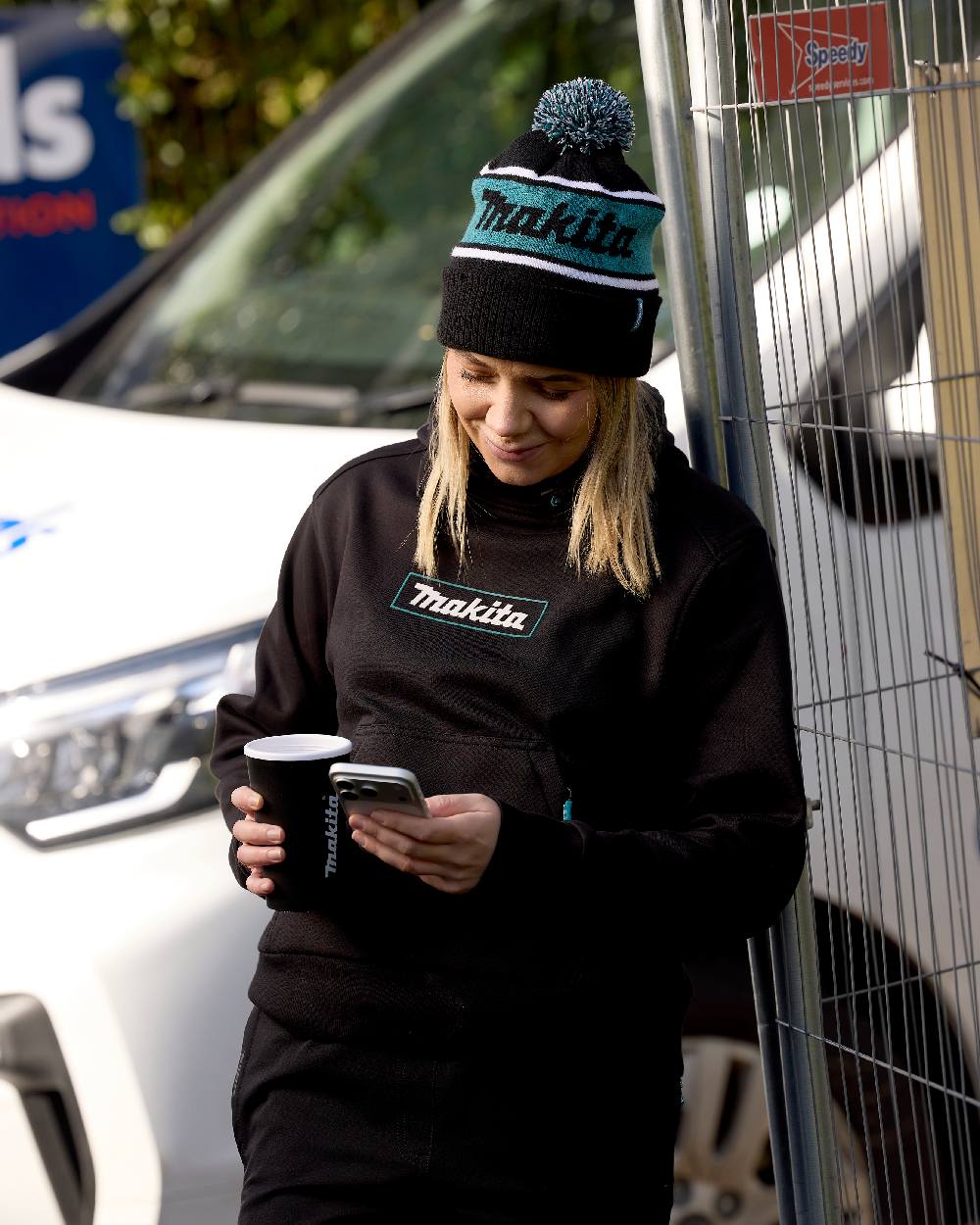 Black Coloured Makita Origin Bobble Hat on outdoor background 