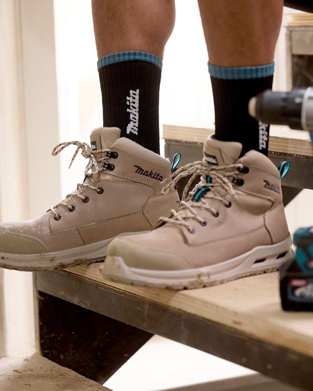 Black Coloured Makita Origin Work Socks on indoor background 