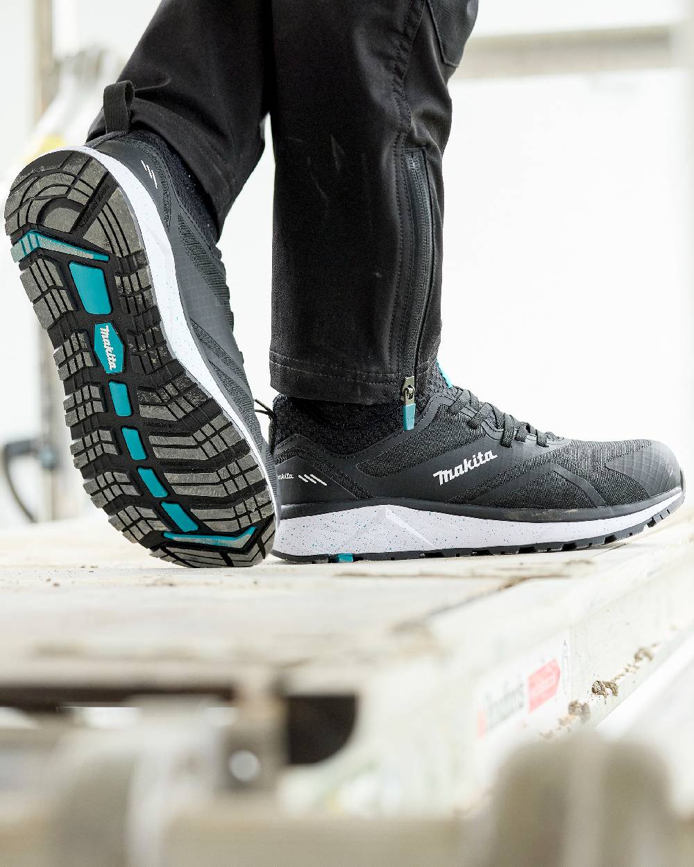 Black Coloured Makita Womens Kobe Safety Trainers on outdoor background 