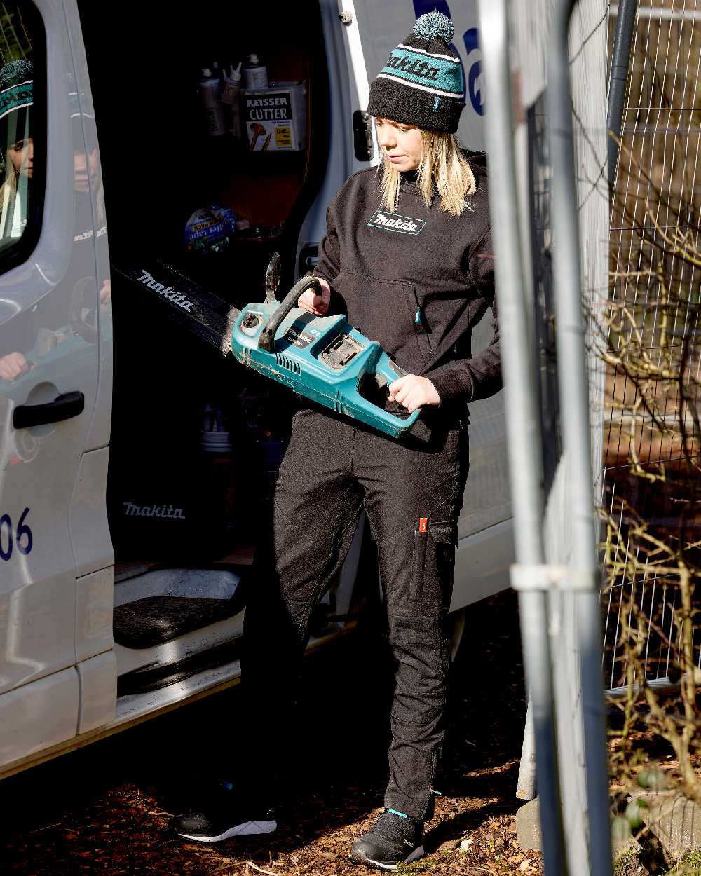 Black Coloured Makita Womens Origin Hoodie on outdoor background 