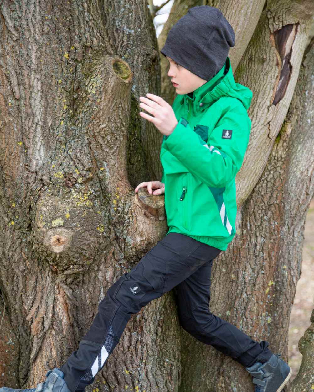 Grass Green Coloured Mascot Workwear Childrens Accelerate Lightweight Outer Shell Jacket on outdoor background 