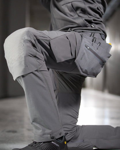 Stone Grey Coloured Mascot Workwear Customized Electrician Holster Pockets on construction background 