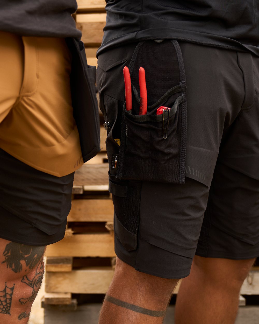 Black Coloured Mascot Workwear Customized Holster Pocket on outdoor background 
