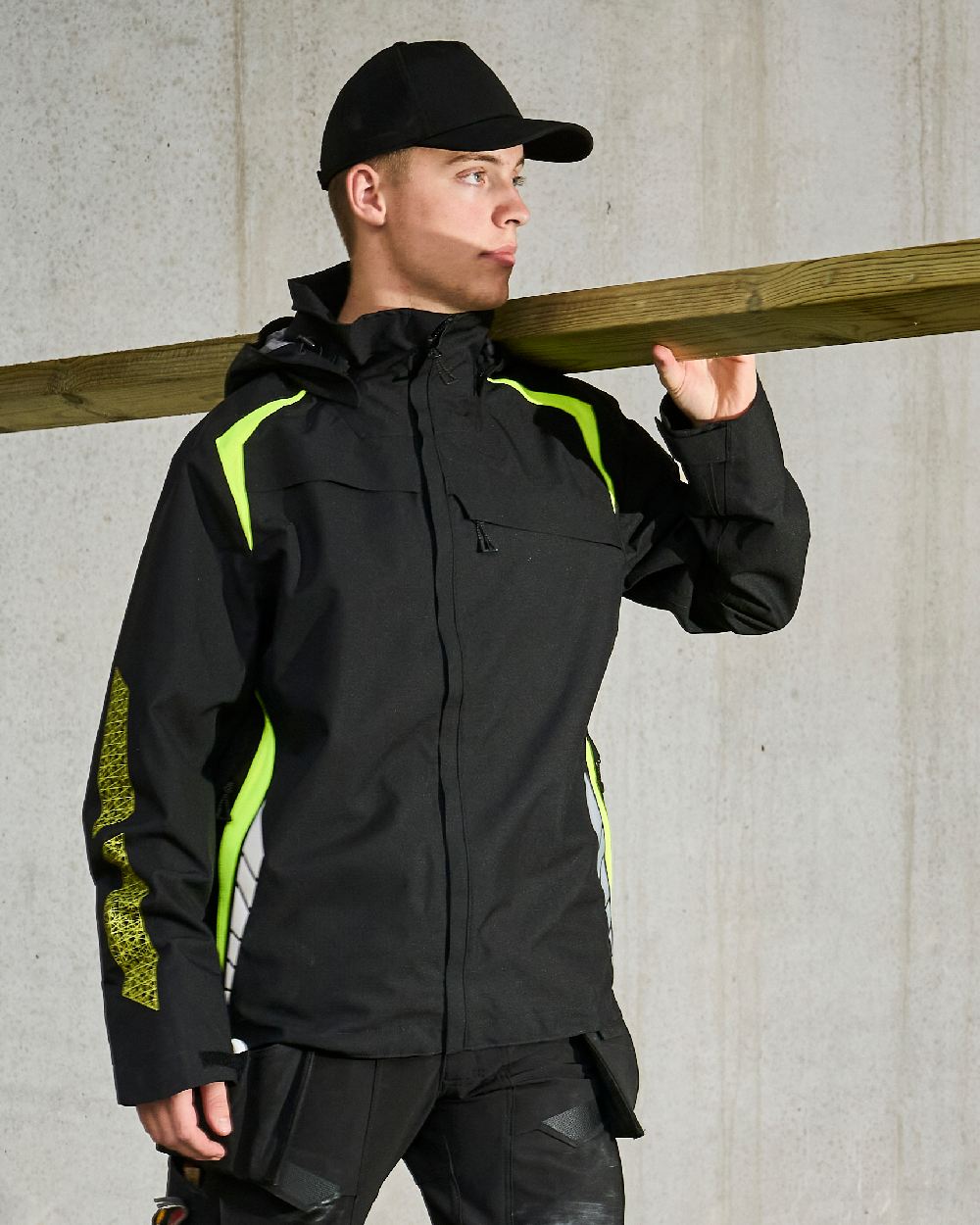 Black Coloured Mascot Workwear Customized Adjustable Cap on construction background 