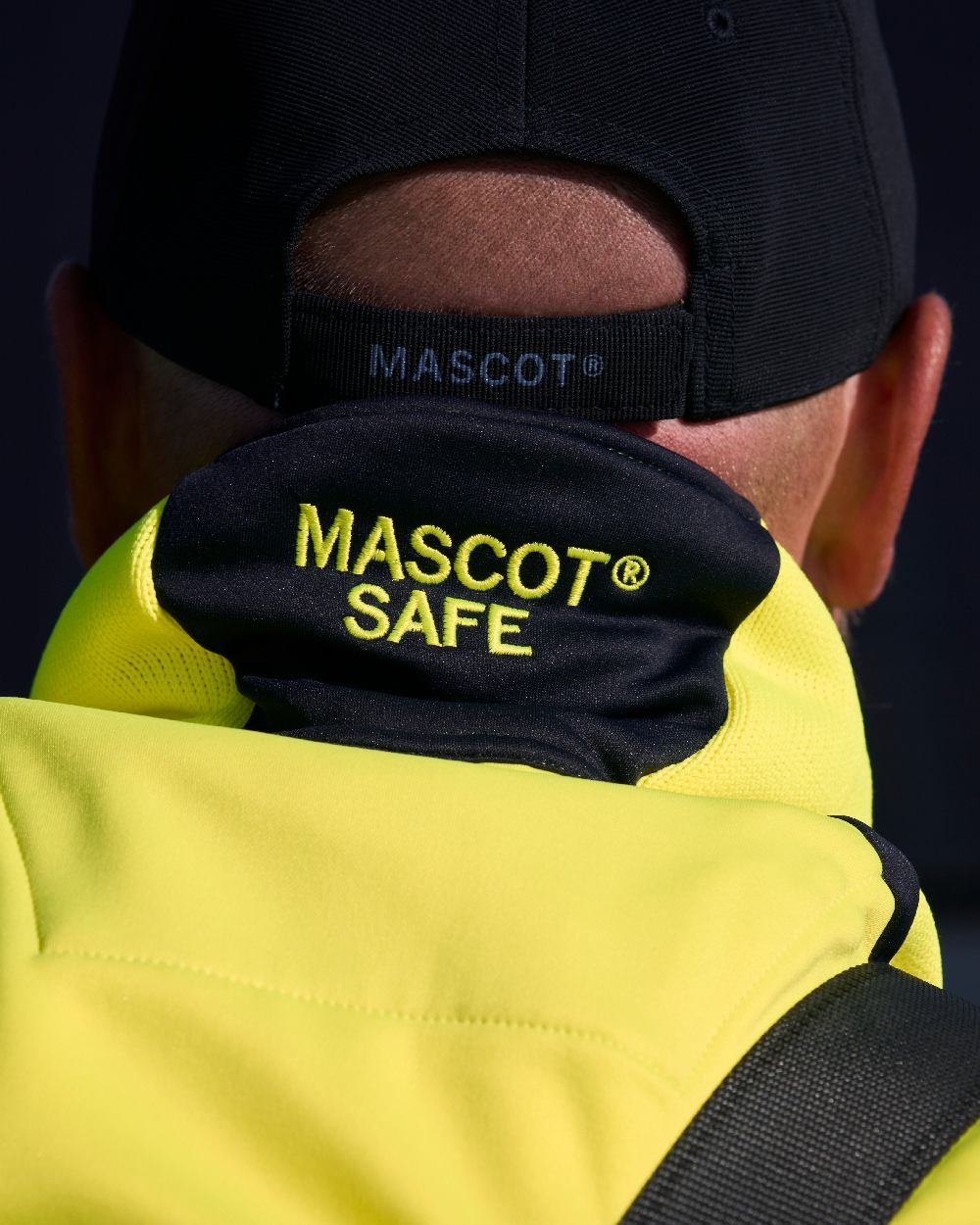 Dark Navy Coloured Mascot Workwear Customized Adjustable Cap on outdoor background 
