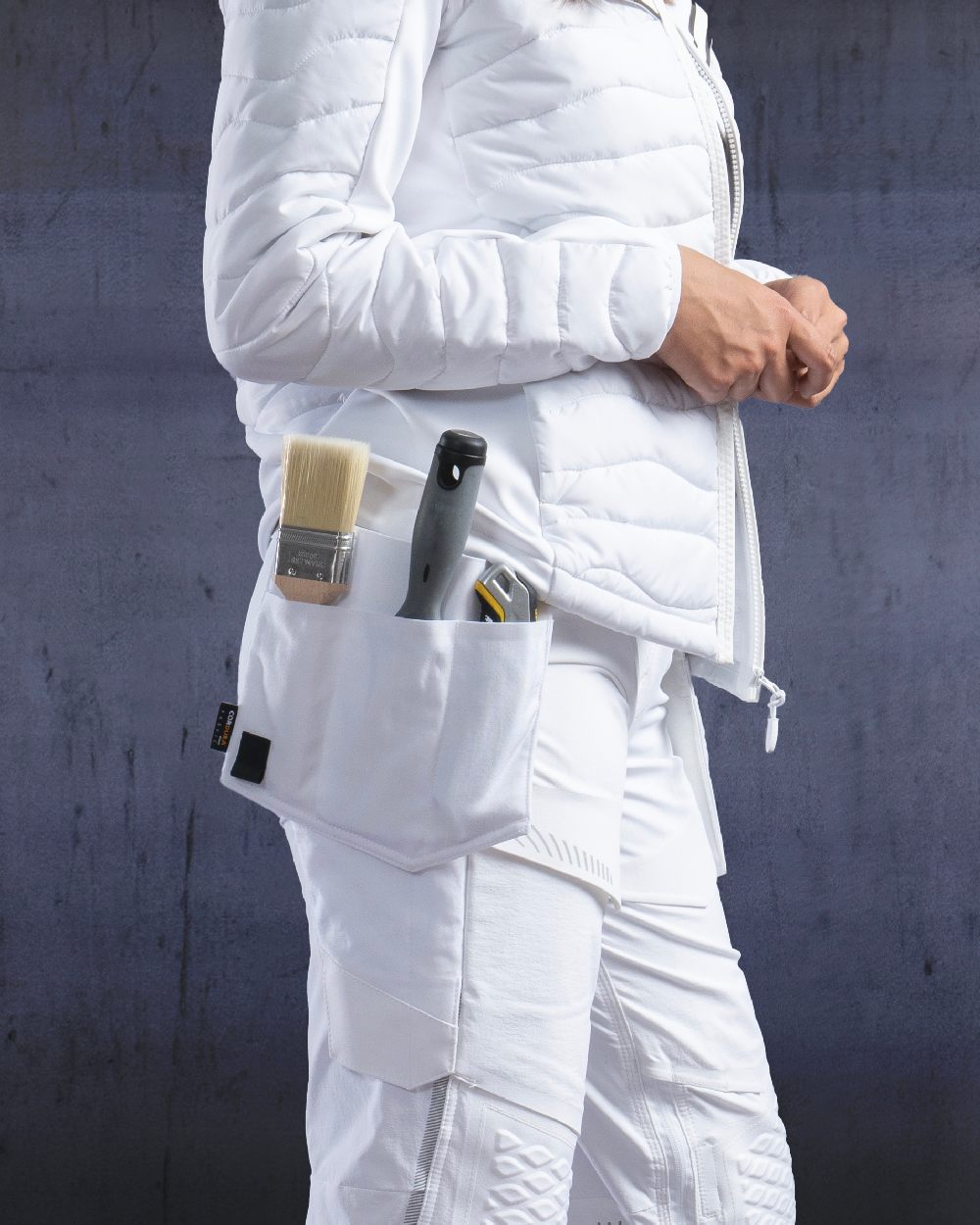 White Coloured Mascot Workwear Customized Set of Two Painter Holster Pockets on indoor background 