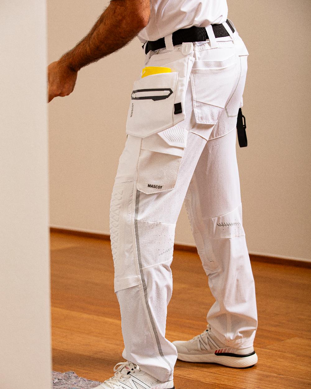 White Coloured Mascot Workwear Customized Set of Two Painter Holster Pockets on indoor background 