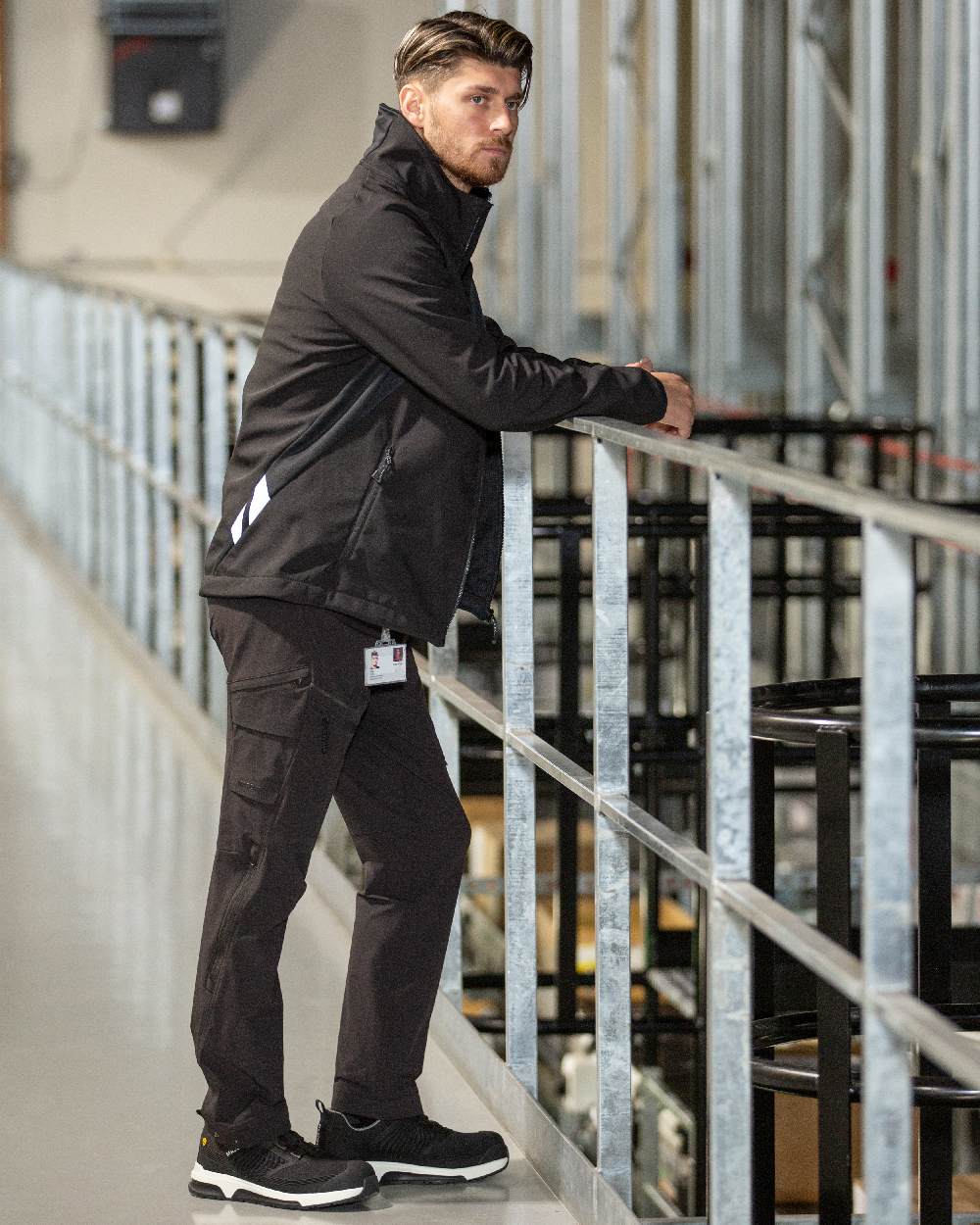 Black Coloured Mascot Workwear Mens Accelerate Breathable Softshell Jacket on factory background 