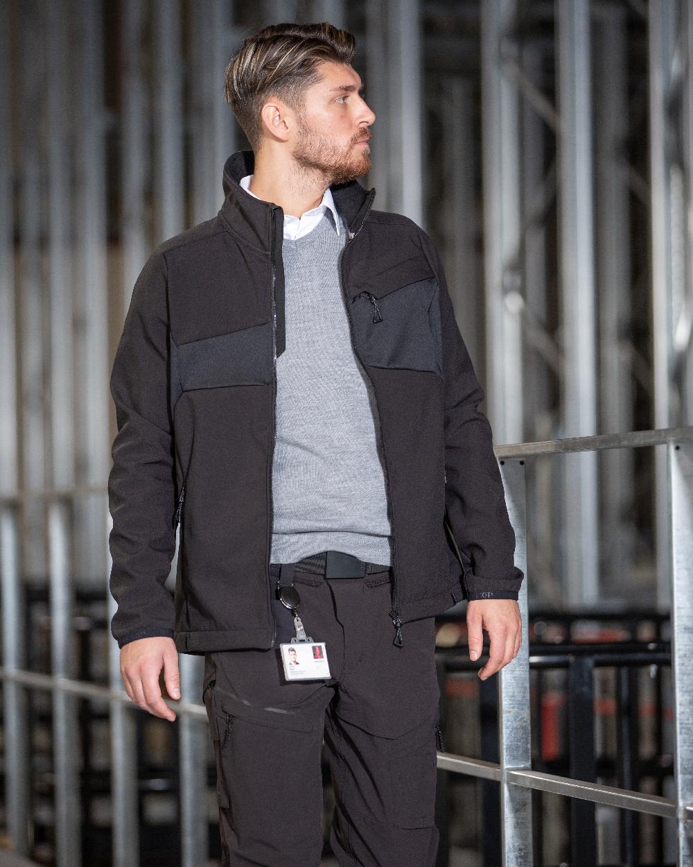 Black Coloured Mascot Workwear Mens Accelerate Breathable Softshell Jacket on factory background 