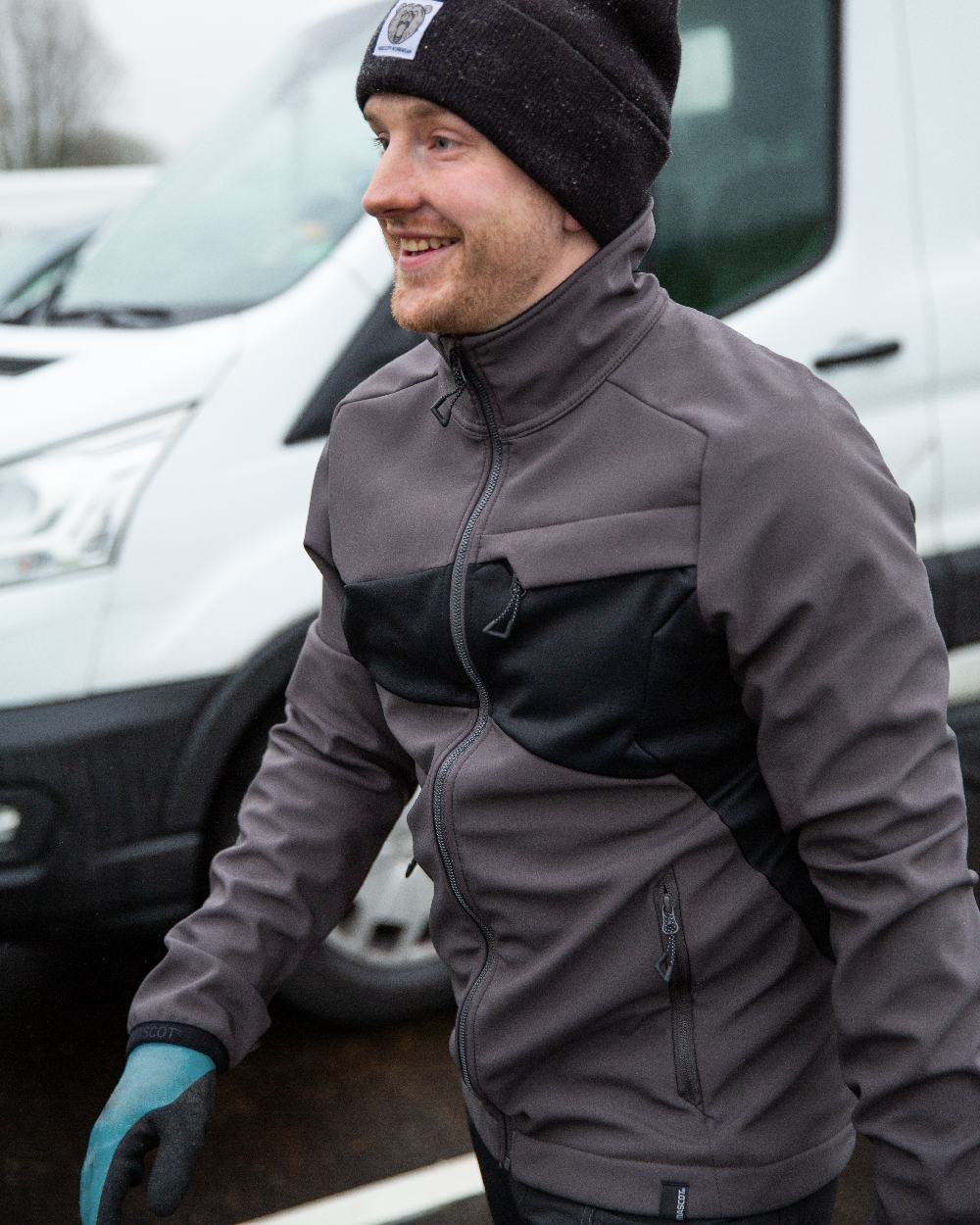 Dark Anthracite Black Coloured Mascot Workwear Mens Accelerate Breathable Softshell Jacket on outdoor background 