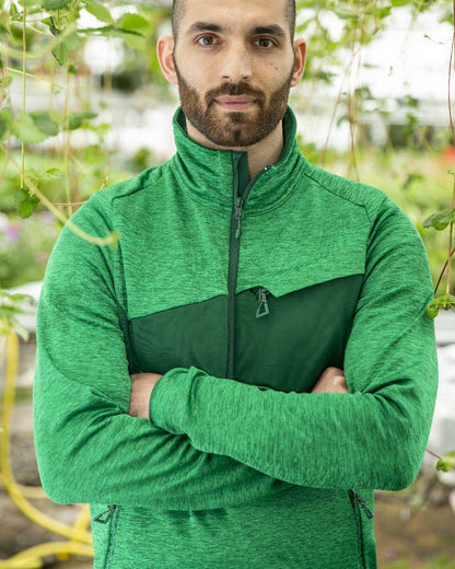 Grass Green Coloured Mascot Workwear Mens Accelerate Fleece Jumper With Half Zip on farm background 