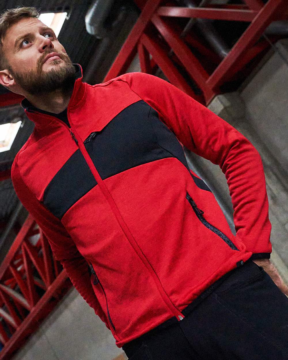 Traffic Red Black Coloured Mascot Workwear Mens Accelerate Fleece Jumper With Zipper on factory background 