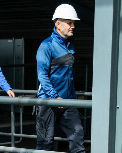 Azure Blue Dark Navy Coloured Mascot Workwear Mens Accelerate Lightweight Jacket on factory background 