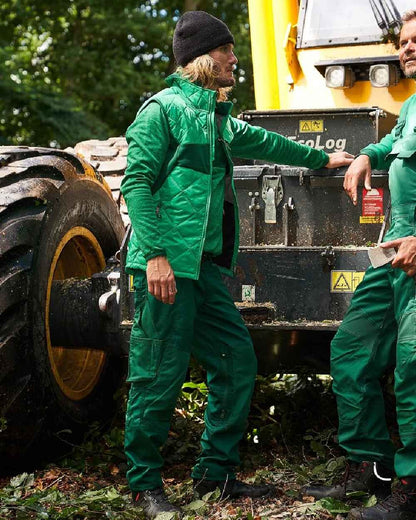 Grass Green Coloured Mascot Workwear Mens Accelerate Lightweight Thermal Gilet on farm background 