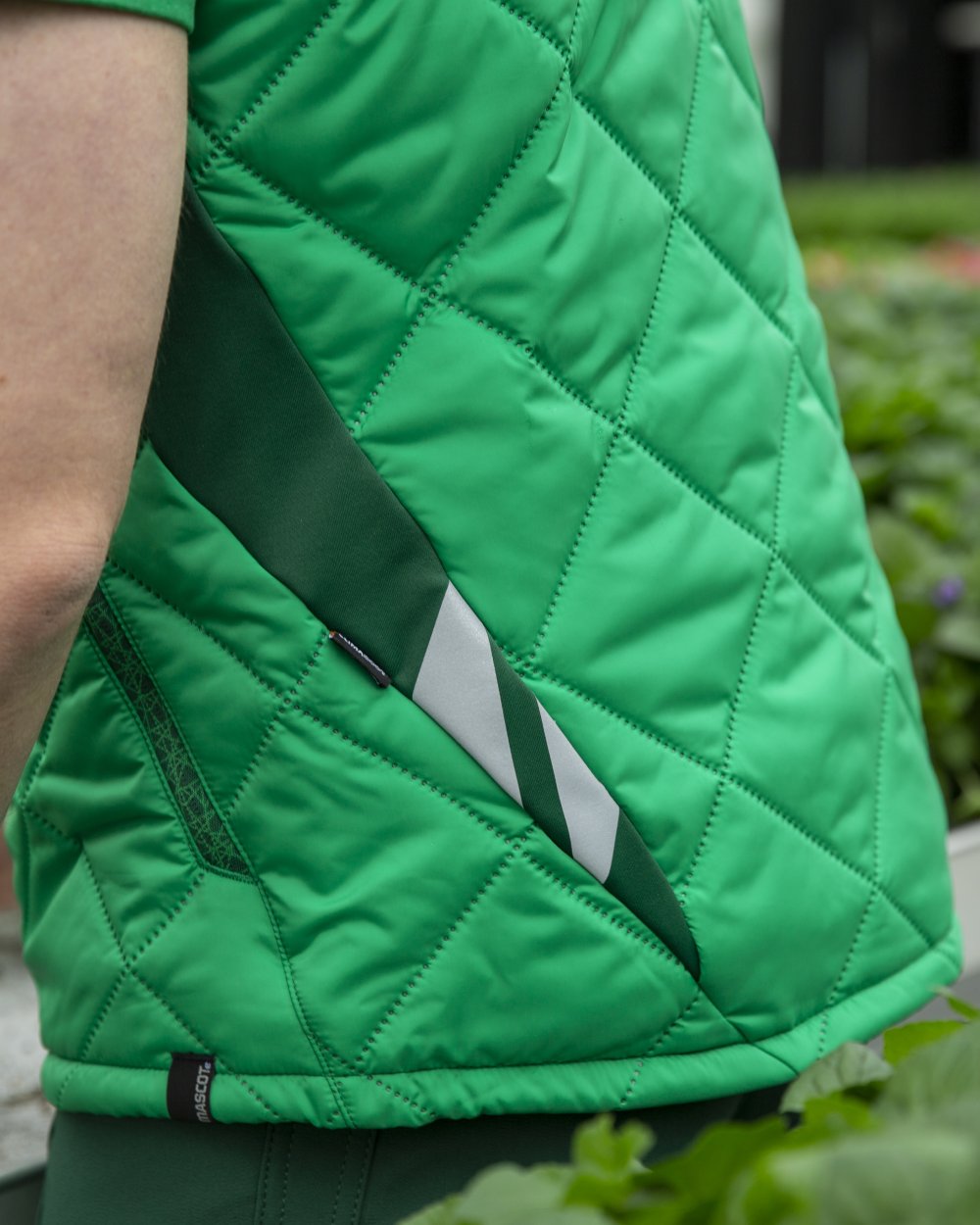 Grass Green Coloured Mascot Workwear Mens Accelerate Lightweight Thermal Gilet on farm background 