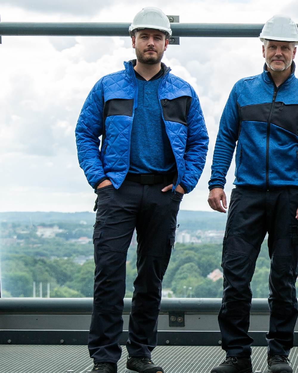 Azure Blue Dark Navy Coloured Mascot Workwear Mens Accelerate Lightweight Thermal Jacket on indoor background 