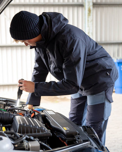 Dark Navy Coloured Mascot Workwear Mens Customized Breathable Winter Jacket on garage background 