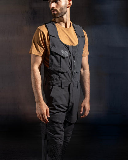 Black Coloured Mascot Workwear Mens Customized Combi Suit With Kneepad Pockets on studio background 