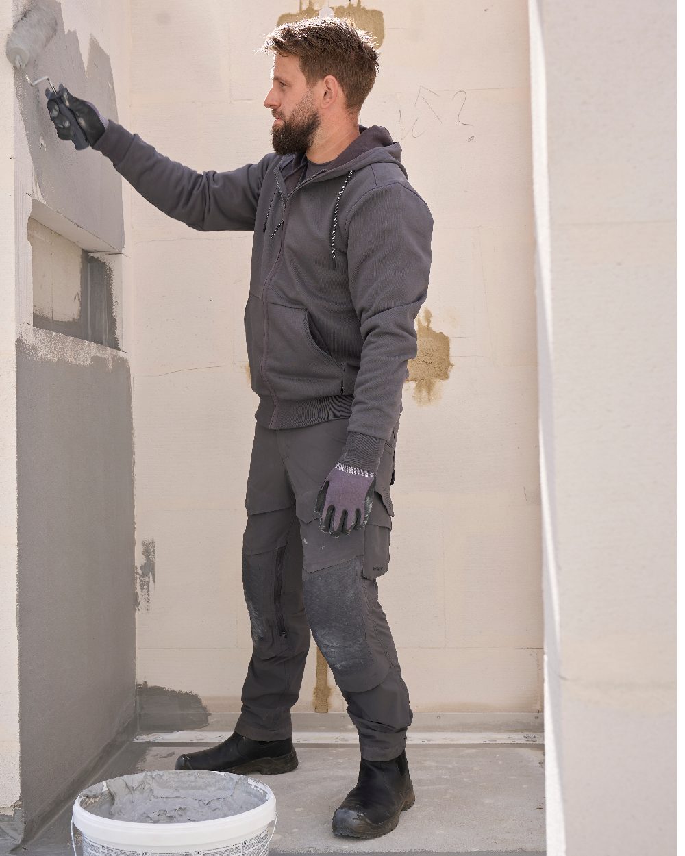 Stone Grey Coloured Mascot Workwear Mens Customized Hoodie With Zipper on indoor background 