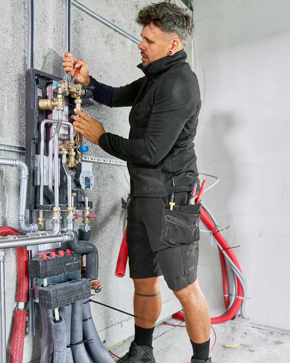 Black Coloured Mascot Workwear Mens Customized Lightweight Shorts on construction background 