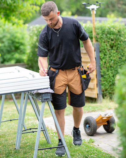 Nut Brown Black Coloured Mascot Workwear Mens Customized Lightweight Shorts on outdoor background 