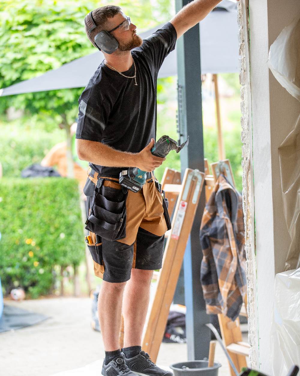 Nut Brown Black Coloured Mascot Workwear Mens Customized Lightweight Shorts on outdoor background 