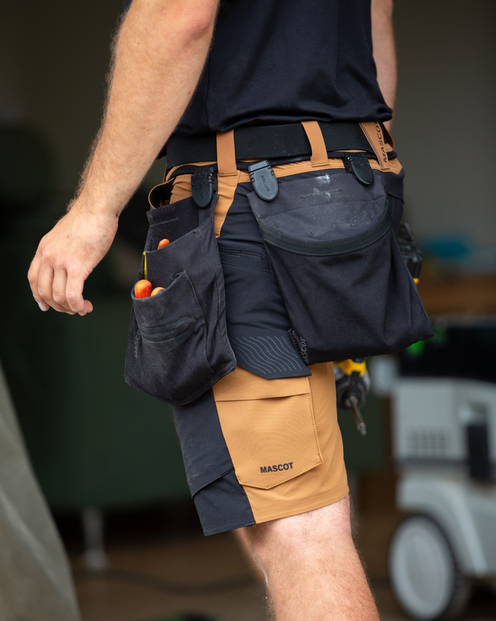 Nut Brown Black Coloured Mascot Workwear Mens Customized Lightweight Shorts on outdoor background 
