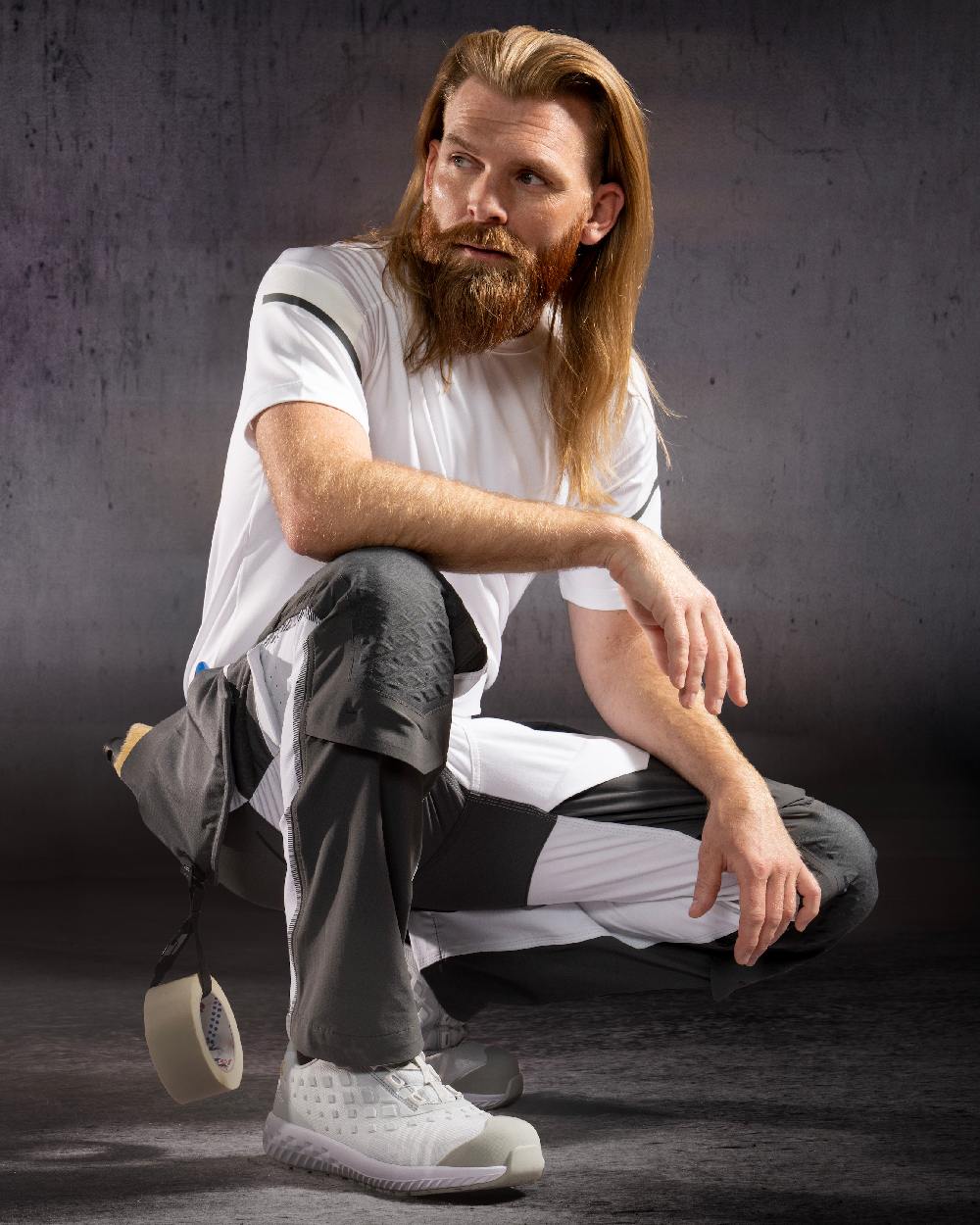 White Stone Grey Coloured Mascot Workwear Mens Customized Lightweight Trousers With Kneepad Pockets on studio background 