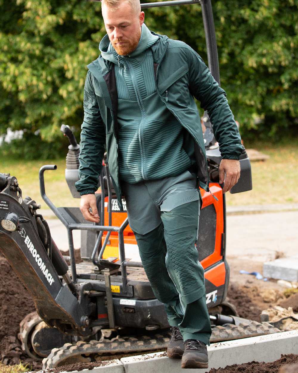 Light Forest Green Coloured Mascot Workwear Mens Customized Ultimate Stretch Trousers on outdoor background 
