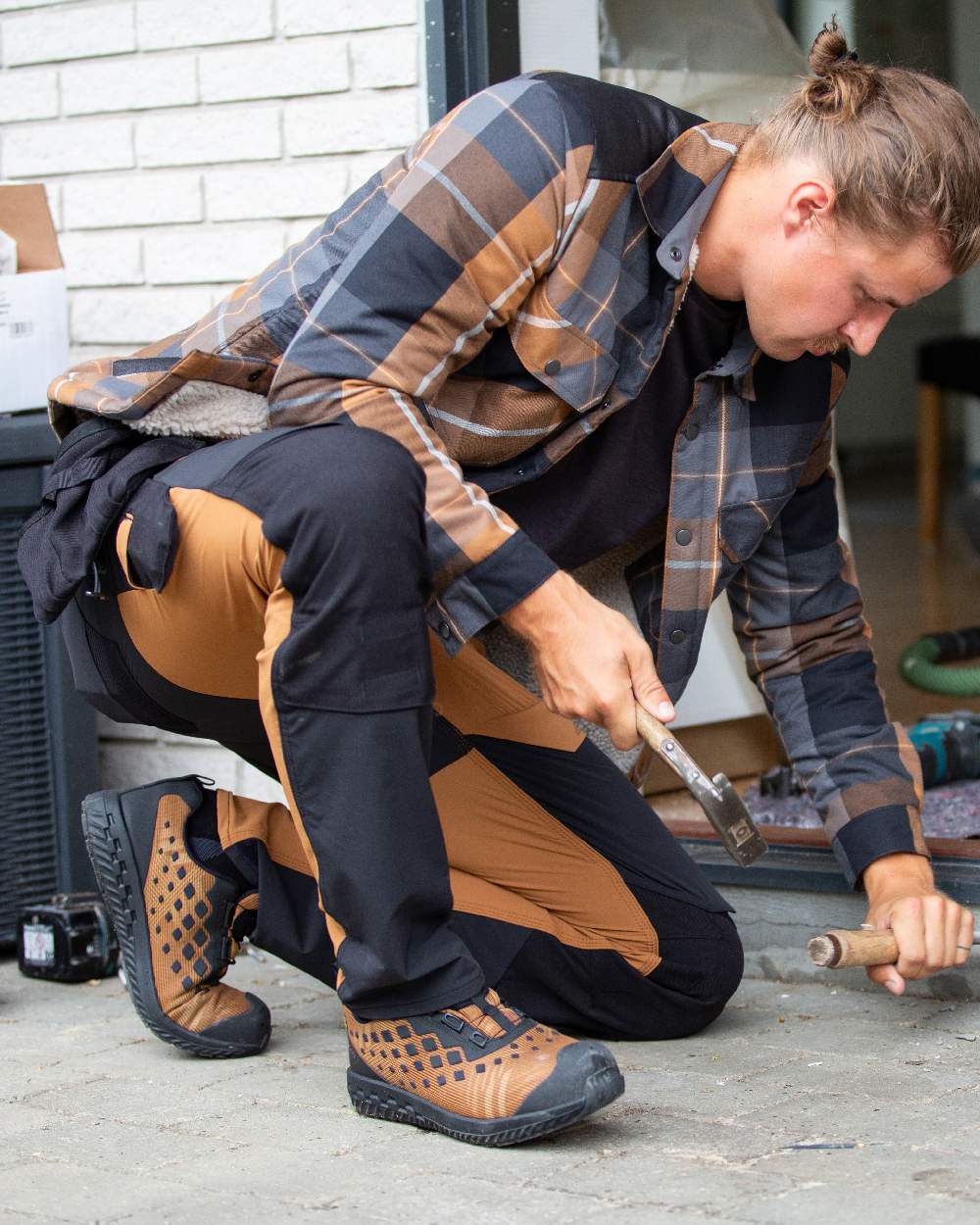 Nut Brown Black Coloured Mascot Workwear Mens Customized Ultimate Stretch Trousers With Kneepad Pockets on outdoor background 