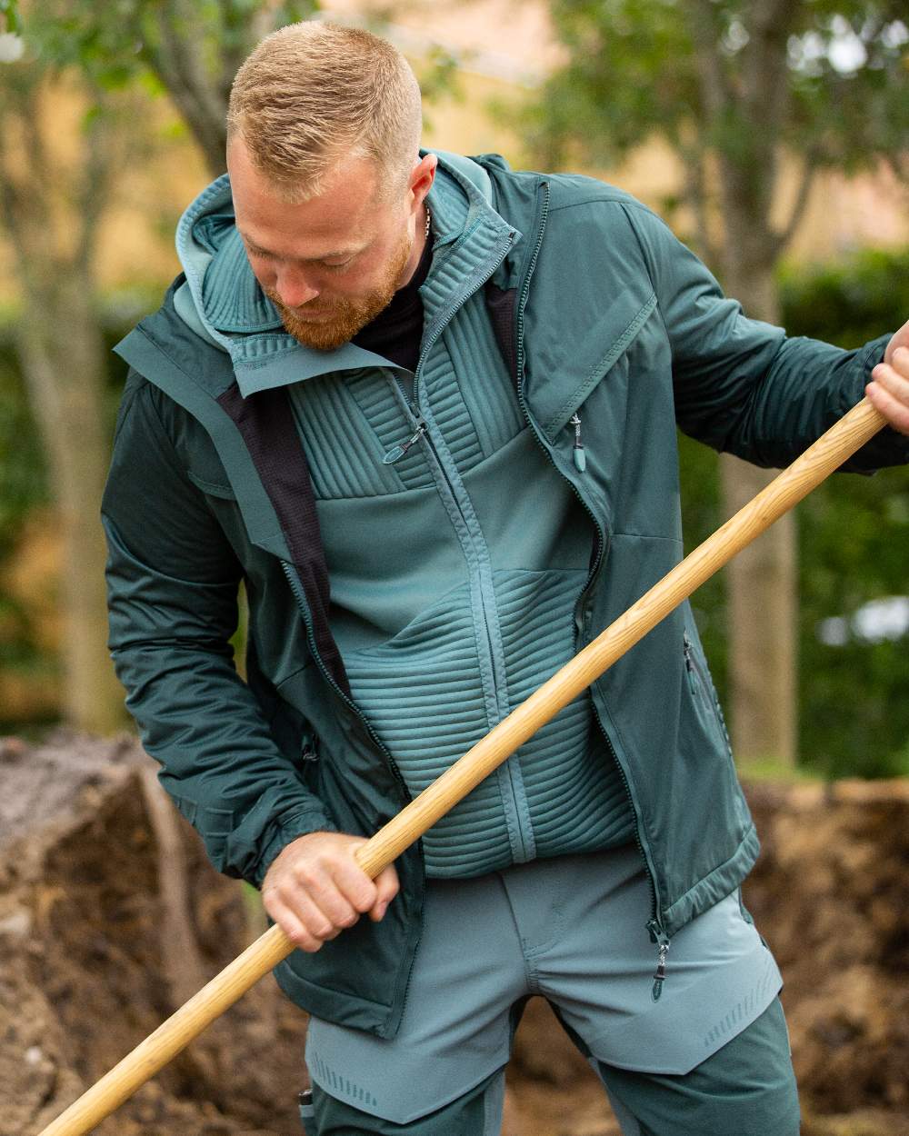 Forest Green Coloured Mascot Workwear Mens Customized Windproof Jacket on outdoor background 