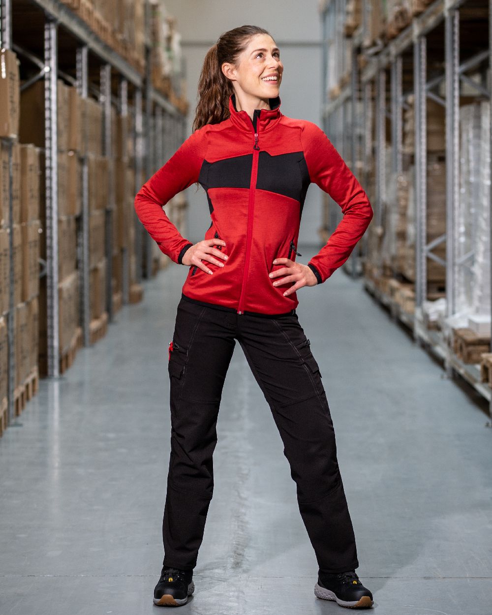 Traffic Red Black Coloured Mascot Workwear Womens Accelerate Fleece Jumper With Zipper on warehouse background 