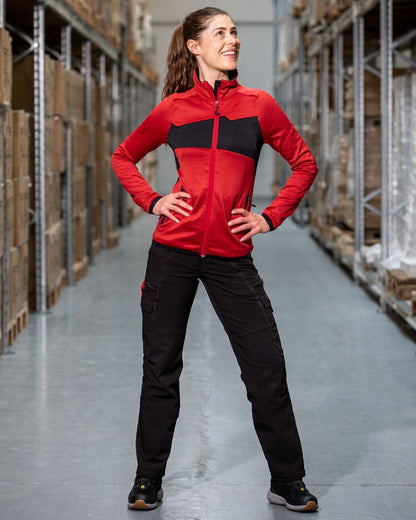 Black Coloured Mascot Workwear Womens Accelerate Ultimate Stretch Trousers on warehouse background 