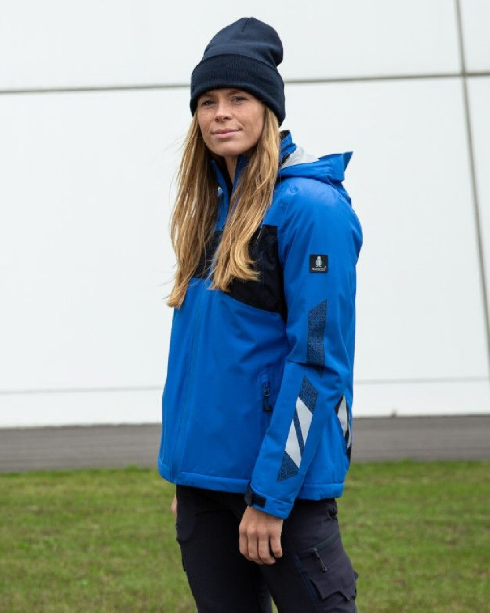 Azure Blue Dark Navy Coloured Mascot Workwear Womens Accelerate Waterproof Winter Jacket on outdoor background 