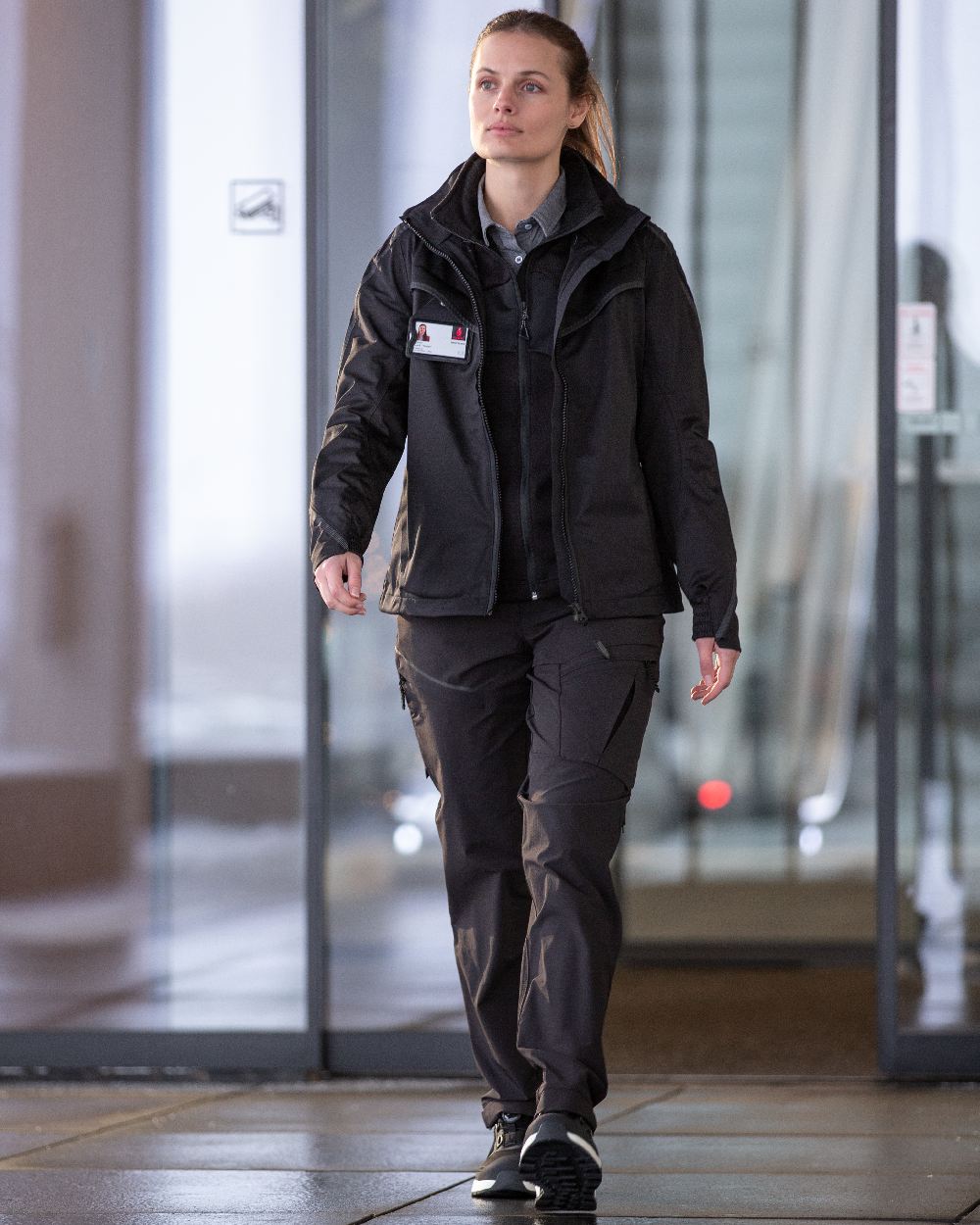 Black Coloured Mascot Workwear Womens Customized Functional Trousers on office background 