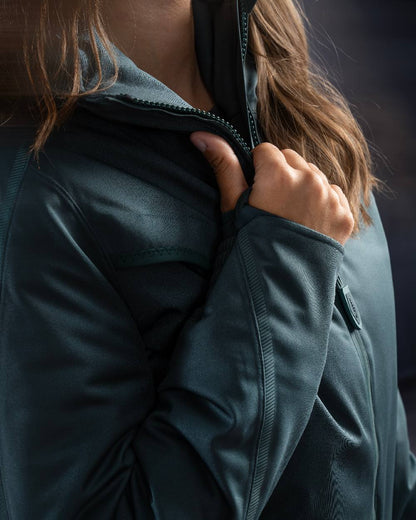 Forest Green Coloured Mascot Workwear Womens Customized Waterproof Winter Jacket on studio background 