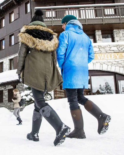 Black Grey Geometric coloured Muck Boots Womens Arctic Ice Tall Wellingtons on snow background 