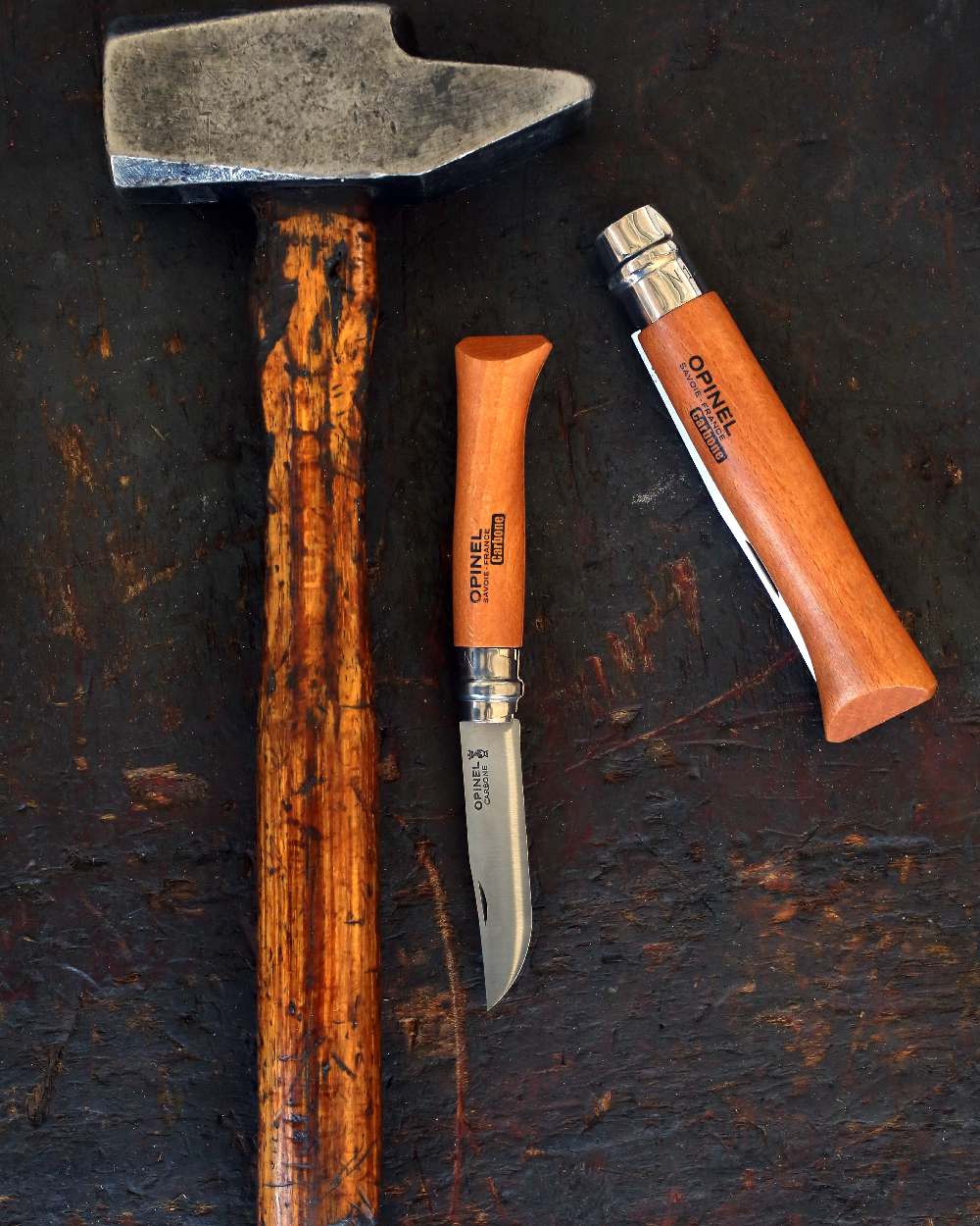 Carbon Steel coloured Opinel Classic Originals Knife on rock background 