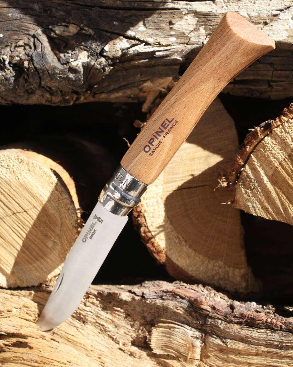 Stainless Steel coloured Opinel Classic Originals Knife on wood background 