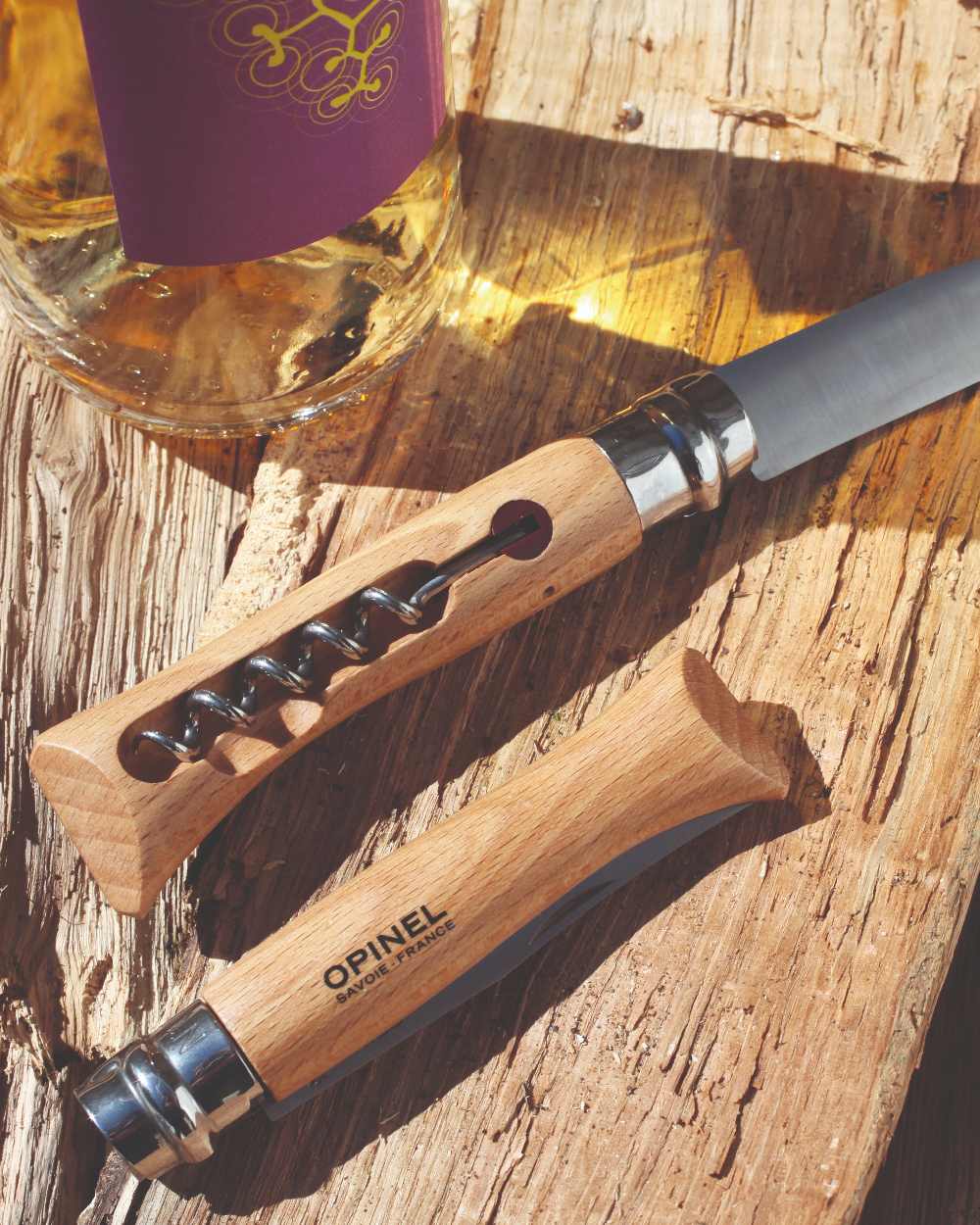 Opinel No.10 Corkscrew Knife on wood background