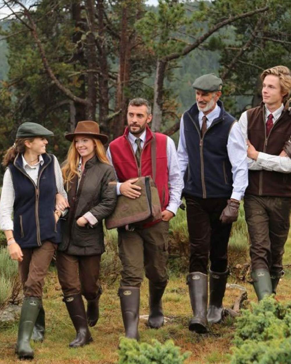 Navy coloured Percussion Ladies Scotland Fleece Gilet on forest background 