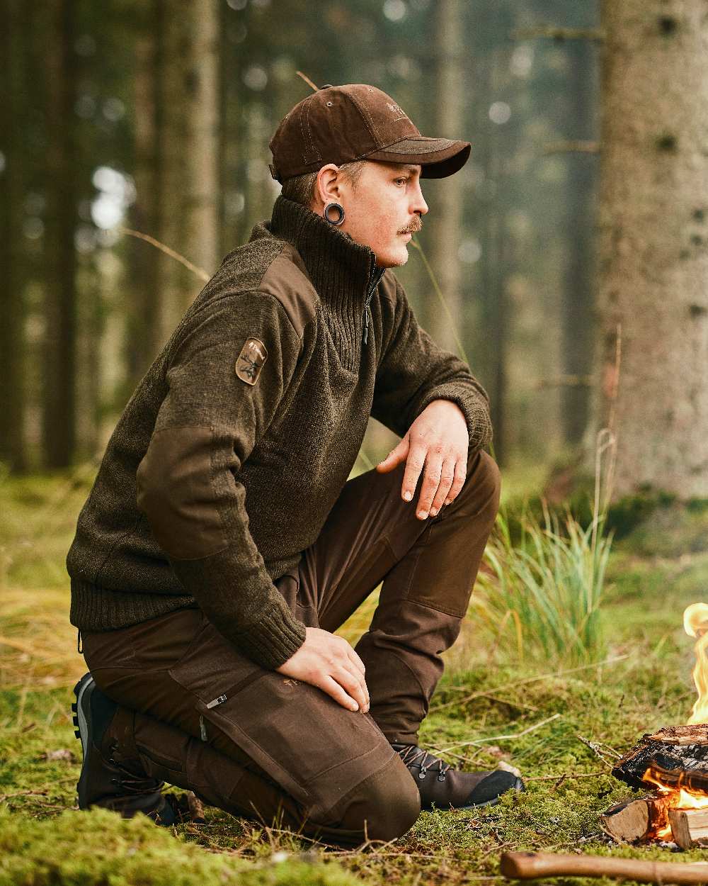 Dark Green Mel Coloured Pinewood Mens Hurricane Sweater on outdoor background 