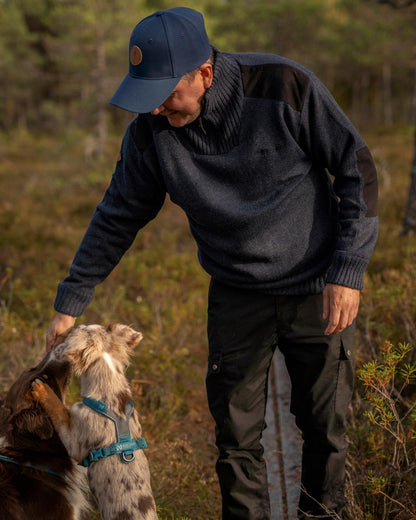Dark Navy Mel Coloured Pinewood Mens Hurricane Sweater on outdoor background 
