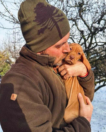 Dark Olive Suede Brown coloured Pinewood Mens Retriever Fleece Jacket on snow background 