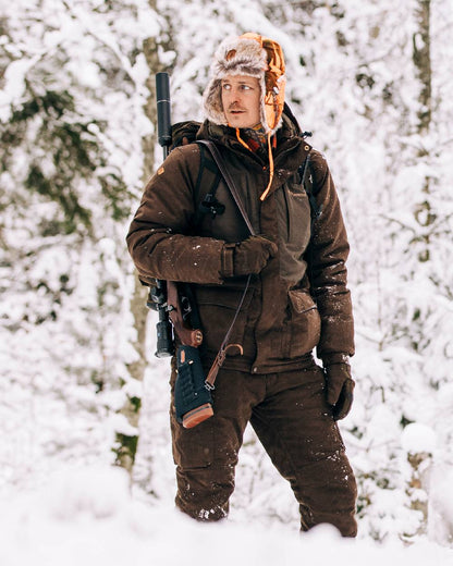 Suede Brown Coloured Pinewood Mens Smaland Abisko 2.0 Hunting Jacket on snow background 
